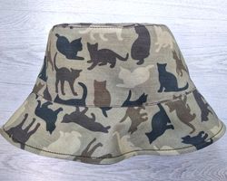 Cotton bucket hat with animalistic, camouflage cat print. Cute summer hat for travel and camping. Fashion designer hat.