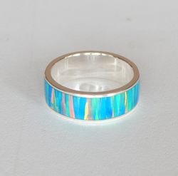 silver ring with synthetic opal. exclusive ring as a gift.