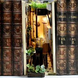 book nook beer bar miniature on a bookshelf insert between books with lighting