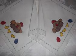 embroidered small towel.towel embroidered with a cross.