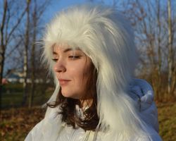 white faux fur hat with earflaps. cute fluffy hat for women. warm fluffy hat with ears. winter fuzzy hat. snow white hat