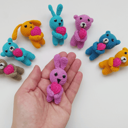 miniature amigurumi pink bunny with heart, stuffed handmade toys