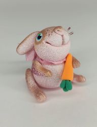 pink miniature bunny with a carrot. animal miniature. rabbit toy. collectible toy. collectible figurine. gift ideas