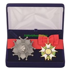 badge and star of the order of the legion of honor in a gift box. france. dummies, copies