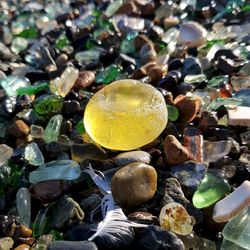 yellow bottle bottom. authentic sea glass.