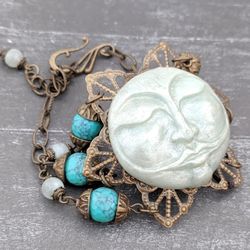 moon phase art nouveau style bracelet from polymer clay, glass and bronze fittings. boho style vintage, full moon ethnic