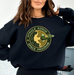 korok space program sweatshirt, zelda korok, hyrule korok sweatshirt, tri force sweatshirt, breath of the wild hylian