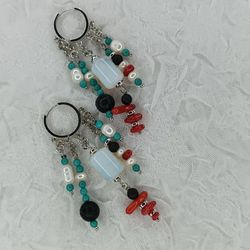 fashionable large multi-colored earrings made of natural stones.