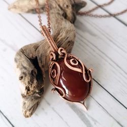 carnelian necklace. wire wrapped copper pendant with red carnelian stone. unusual handcrafted gift.