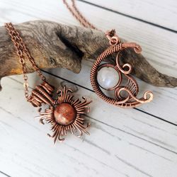 sun and moon necklace set. sunstone and moonstone necklaces. wire wrapped copper pendants with sunstone and moonstone.