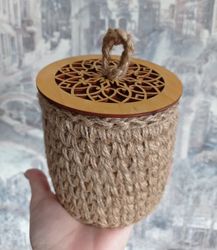 a jute basket with a wooden lid, a handmade basket, a box for storing jewelry and small things