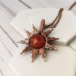 wire wrapped copper pendant with natural carnelian. star necklace with carnelian bead.