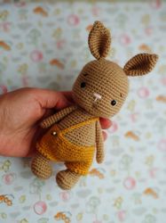 little bunny toy. crochet rabbit ,knitted hare, symbol of 2023. stuffed forest animals.