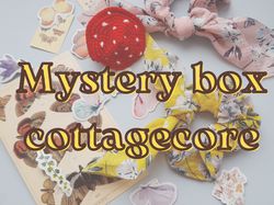 mystery box cottegcore, stickers with mushrooms,a bag of crystals, cosplay accessories.