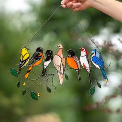 multicolor stained window bird hangings