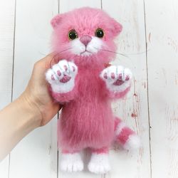 soft toy cat pink with movable paws, realistic pink cat,  fluffy pink kitten gift idea for a girl, pet for a gentle hug