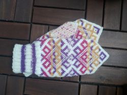 women's hand-knitted wool mittens are very warm with a pattern