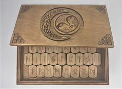 rune set of elder futhark in a box with a hidden lock secret of sun and moon. wooden runes in a box with puzzle lock.