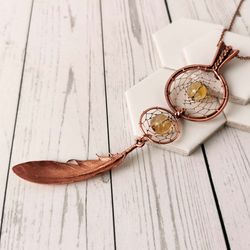 wire wrapped dreamcatcher necklace with electroformed feather and citrine. copper dreamcatcher with citrine beads.
