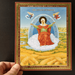 the mother of god bread wrangler |  gold and silver foiled icon on wood | size: 8 3/4"x7 1/4"