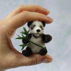 small panda with bamboo. realistic miniature toy. great gift for pet lovers