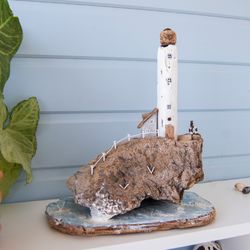 an island made of wood, a lighthouse, an original and eco-friendly gift in a nautical style, a driftwood, a miniature