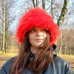 a red panama hat made of faux fur. festival fuzzy neon bucket hat. red fluffy hat. rave bucket hat. bright shaggy hat.