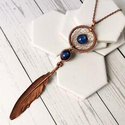 copper dreamcatcher with kyanite beads. wire wrapped dreamcatcher necklace with electroformed feather and kyanite.