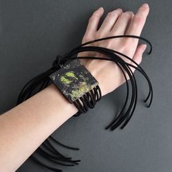 fringed wooden bracelet-pendant transformer