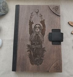 book of shadows with priestess.  wooden cover grimoire. spell book. black magic witch journal. book of magic.