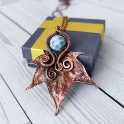 copper leaf pendant with larimar. wire wrapped copper necklace with real electroformed maple leaf and larimar bead.