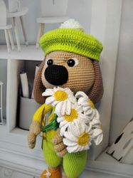 order. crocheted puppy. cute stuffed toy with flowers.