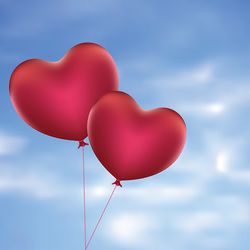 romantic red balloons in a shape of a heart