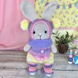 cute stuffed plush bunny in overalls