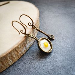 Frying pan earrings or fried eggs earrings are weird, funny, quirky funky trendy jewelry