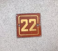 red gold glass apartment 22 door number sign square shape