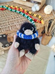 stuffed baby niffler from the movie fantastic beasts decor.  scamander fantasy creature best friend gift .dark academia