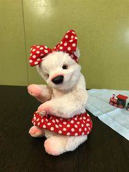 pink teddy bear in a polka dot skirt