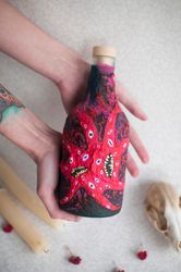 decorative alcohol red and black bottle, bottle collecting, goth gift, creeping chaos, mystique, nyarlathotep, lovecraft