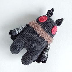 crochet pattern mothman amigurumi toy. cryptid ornament