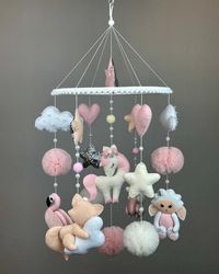 unicorn baby mobile in a cribe. baby mobile for girl. unicorn mobile