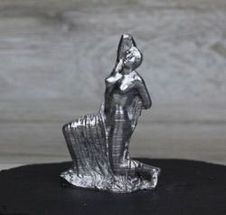 dying niobid sculpture, figurine, interior object