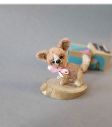 chihuahua is a soft doll dog. miniature knitted puppy. a dog figurine as a gift for the holiday