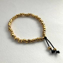 handmade eco friendly stretch bracelet - gold metal beads