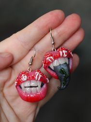 red lip earrings with fly agaric