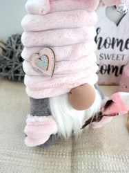 pink plush gnome stuffed doll with bird