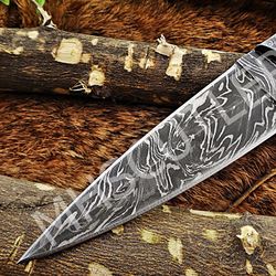 custom handmade damascus steel skinner knife with bone and horn handle.