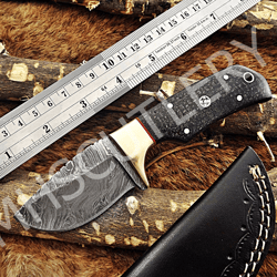 custom handmade damascus steel hunting skinner knife with micarta handle and leather sheath.