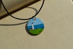 lighthouse landscape glass pendant. hand painted seascape. glass necklace.