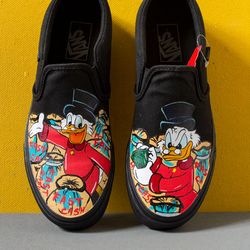 scrooge mcduck hand painted slip-ons, black custom vans sneakers,  dollar money shoes